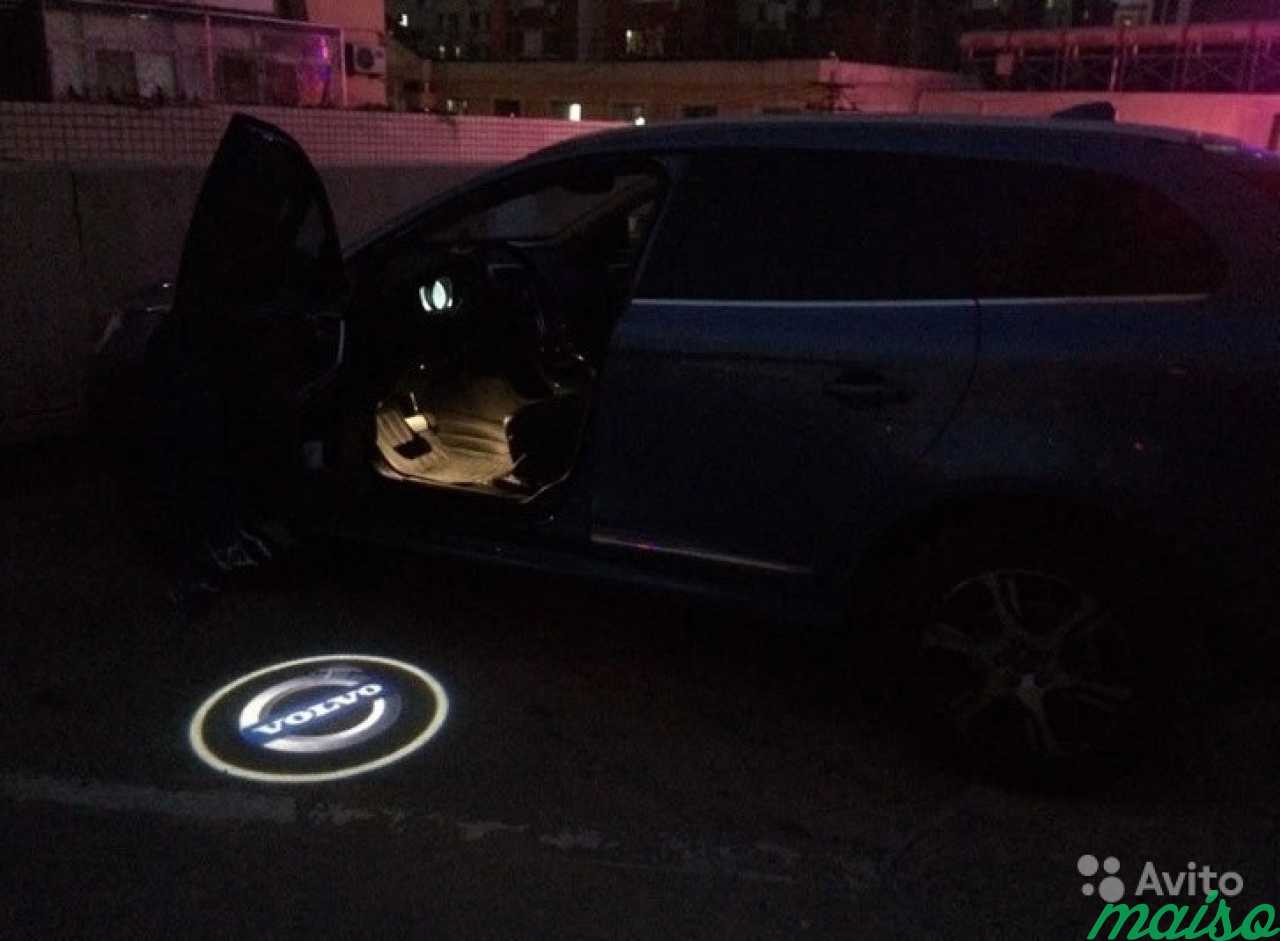 Подсветка в двери с логотипом Volvo 7w в Санкт-Петербурге. Фото 2