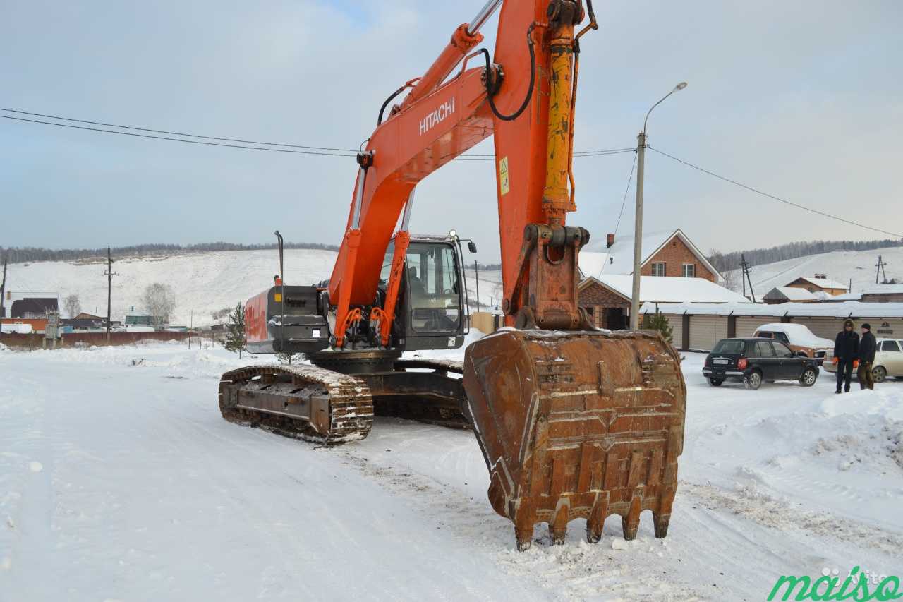 Аренда гусеничного полноповоротного экскаватора в Москве. Фото 2