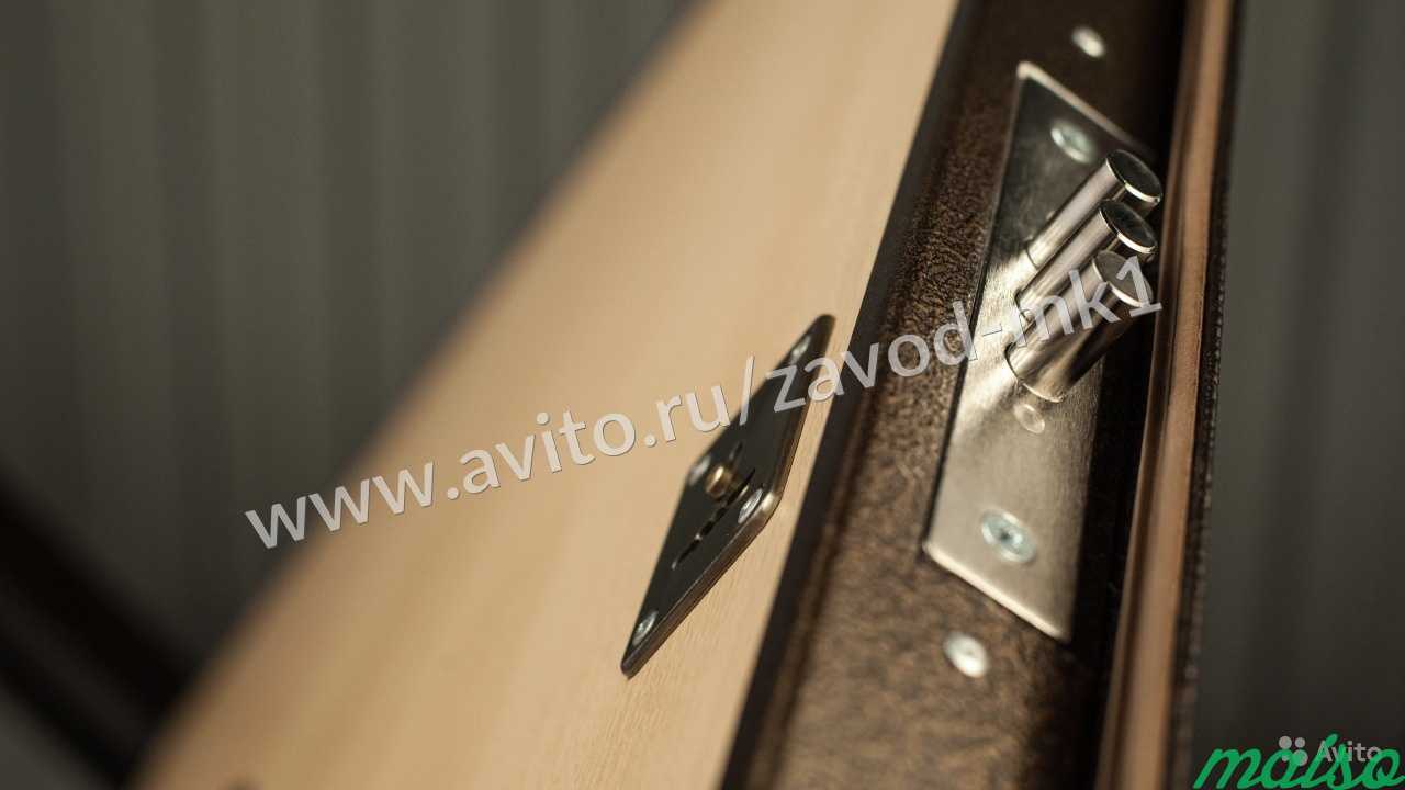 Дверь из железа с отделкой ламинатом в квартиру в Москве. Фото 6