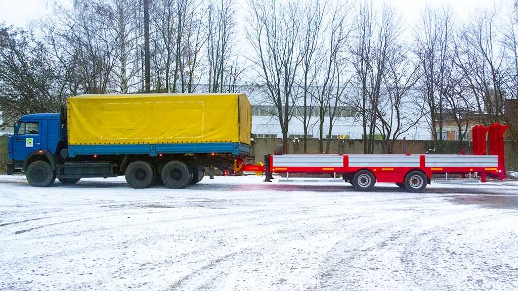 Низкорамный прицеп для перевозки спец техники до 19 тонн в Москве. Фото 7