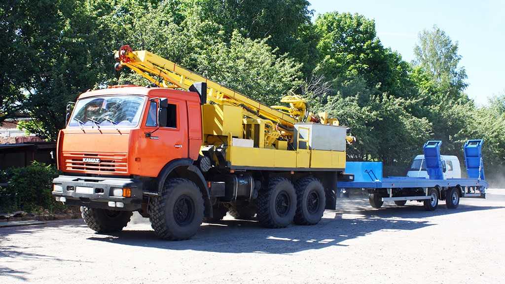 Низкорамный прицеп для перевозки спец техники до 19 тонн в Москве. Фото 8