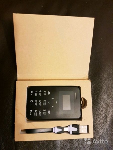 ding'> Сотовый телефон Card phone размером с визитку в Москве. Фото 1